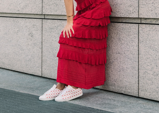 A woman modeling The Nou Project sneakers