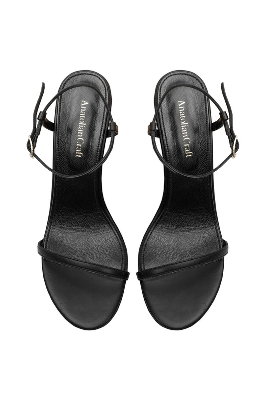 WHISPERING POPPIES - BLACK LEATHER WEDGED SANDALS