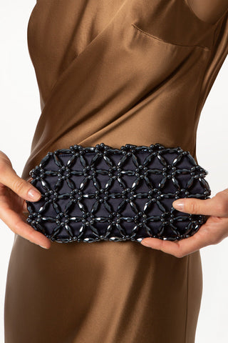 Navy blue Tebea beaded clutch, detail of the daisy weave