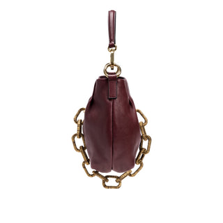 Catena burgundy small shoulder pouch seen from the side