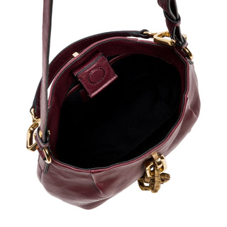 Interior of the Catena burgundy small shoulder pouch with inner pocket