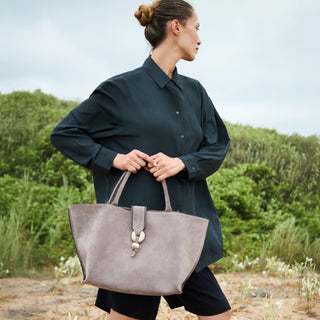 Boho Chic taupe tote worn by a model
