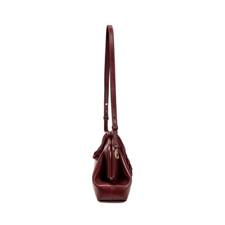 Alessa burgundy leather pouch bag with crossbody strap, side view