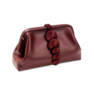 Alessa burgundy leather pouch bag with hand-knotted coin detail